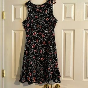 White House Black Market women’s dress size 12. NWT. Black sleeveless flowers.